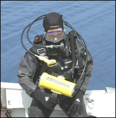 A diver holding a PR-1