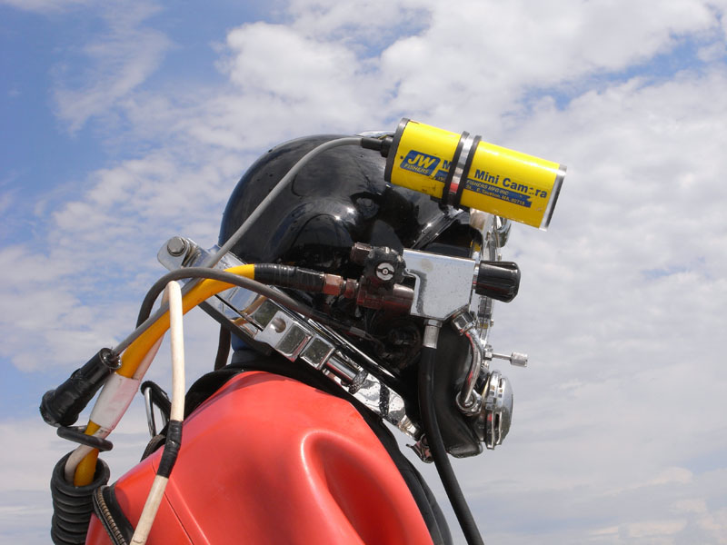 A diver using MC-2 attached on his helmet